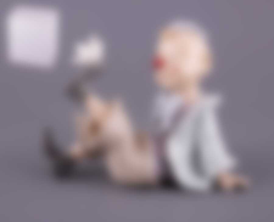 Статуэтка "КЛОУН"высота=11 см длина=15 см.