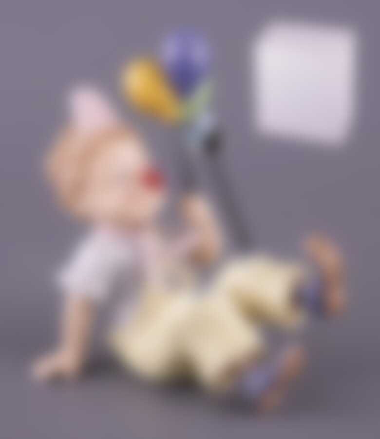 Статуэтка "КЛОУН"высота=14 см длина=15 см.